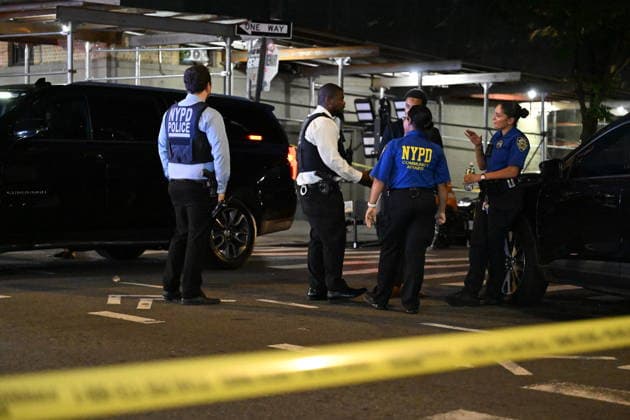 12-year-old boy killed, two men injured in Bronx shooting BRONX, NEW YORK, UNITED STATES - JULY 25: NYPD officers work the scene where a 12-year-old boy was killed and two men were injured in a shooting outside of a Supermarket and Deli at 104 Elliot Place in Bronx, New York, United States on July 25, 2026. Saturday afternoon at approximately 4:55 pm the shooting took place. A 12-year-old boy was shot to the shoulder and taken to Lincoln Hospital where he was pronounced dead. A 25-year-old man was shot to the buttocks and a 34-year-old man was shot to the foot. Both men are listed in stable condition at the hospital. There are no arrests, the identity of the deceased is pending proper family notification and the investigation is ongoing by  Copyright: x2026xAnadoluxKylexMazzax