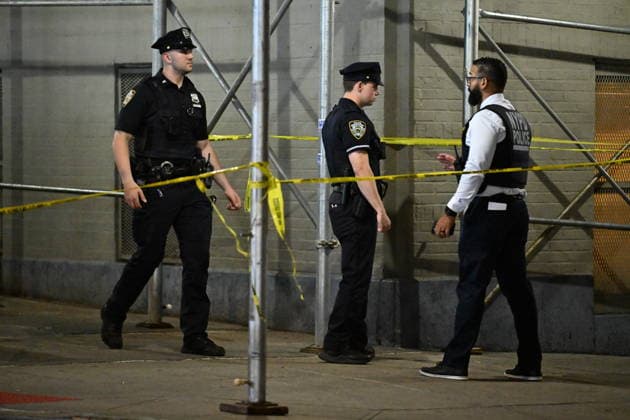 12-year-old boy killed, two men injured in Bronx shooting BRONX, NEW YORK, UNITED STATES - JULY 25: NYPD officers work the scene where a 12-year-old boy was killed and two men were injured in a shooting outside of a Supermarket and Deli at 104 Elliot Place in Bronx, New York, United States on July 25, 2026. Saturday afternoon at approximately 4:55 pm the shooting took place. A 12-year-old boy was shot to the shoulder and taken to Lincoln Hospital where he was pronounced dead. A 25-year-old man was shot to the buttocks and a 34-year-old man was shot to the foot. Both men are listed in stable condition at the hospital. There are no arrests, the identity of the deceased is pending proper family notification and the investigation is ongoing by  Copyright: x2026xAnadoluxKylexMazzax
