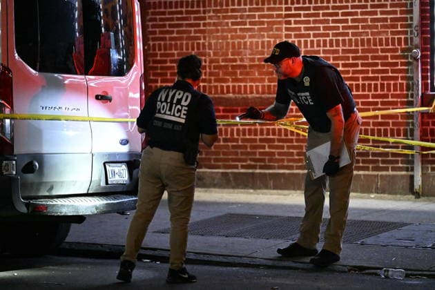 12-year-old boy killed, two men injured in Bronx shooting BRONX, NEW YORK, UNITED STATES - JULY 25: NYPD officers work the scene where a 12-year-old boy was killed and two men were injured in a shooting outside of a Supermarket and Deli at 104 Elliot Place in Bronx, New York, United States on July 25, 2026. Saturday afternoon at approximately 4:55 pm the shooting took place. A 12-year-old boy was shot to the shoulder and taken to Lincoln Hospital where he was pronounced dead. A 25-year-old man was shot to the buttocks and a 34-year-old man was shot to the foot. Both men are listed in stable condition at the hospital. There are no arrests, the identity of the deceased is pending proper family notification and the investigation is ongoing by  Copyright: x2026xAnadoluxKylexMazzax