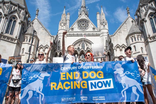 Demonstration against Greyhound race in London, UK - 25 Jul 2026 Animal rights activists hold a banner and chant slogans outside of the Royal Courts of Justice during a protest march. Animal rights activists gathered outside of the Greyhound Board of Great Britain (GBGB) headquarters near the St Paul s Cathedral. The Greyhound Board of Great Britain (GBGB) serves as the governing and regulatory body for licensed greyhound racing in England because it was banned previously in Wales and Scotland. The protesters demand from the UK Government to ban the Greyhound racing immediately because 161 dog died during and after the race, just in 2025. London United Kingdom Copyright: xKrisztianxElekx xSOPAxImagesx SSS_20260725_GREYHOUND_DEMO_0011005077