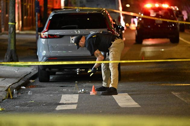 12-year-old boy killed, two men injured in Bronx shooting BRONX, NEW YORK, UNITED STATES - JULY 25: NYPD officers work the scene where a 12-year-old boy was killed and two men were injured in a shooting outside of a Supermarket and Deli at 104 Elliot Place in Bronx, New York, United States on July 25, 2026. Saturday afternoon at approximately 4:55 pm the shooting took place. A 12-year-old boy was shot to the shoulder and taken to Lincoln Hospital where he was pronounced dead. A 25-year-old man was shot to the buttocks and a 34-year-old man was shot to the foot. Both men are listed in stable condition at the hospital. There are no arrests, the identity of the deceased is pending proper family notification and the investigation is ongoing by  Copyright: x2026xAnadoluxKylexMazzax
