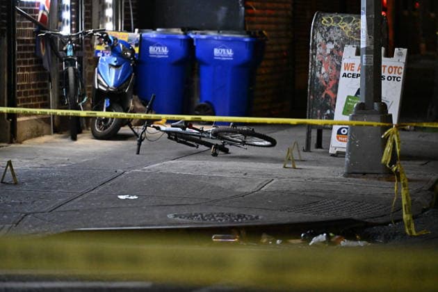 12-year-old boy killed, two men injured in Bronx shooting BRONX, NEW YORK, UNITED STATES - JULY 25: NYPD officers work the scene where a 12-year-old boy was killed and two men were injured in a shooting outside of a Supermarket and Deli at 104 Elliot Place in Bronx, New York, United States on July 25, 2026. Saturday afternoon at approximately 4:55 pm the shooting took place. A 12-year-old boy was shot to the shoulder and taken to Lincoln Hospital where he was pronounced dead. A 25-year-old man was shot to the buttocks and a 34-year-old man was shot to the foot. Both men are listed in stable condition at the hospital. There are no arrests, the identity of the deceased is pending proper family notification and the investigation is ongoing by  Copyright: x2026xAnadoluxKylexMazzax