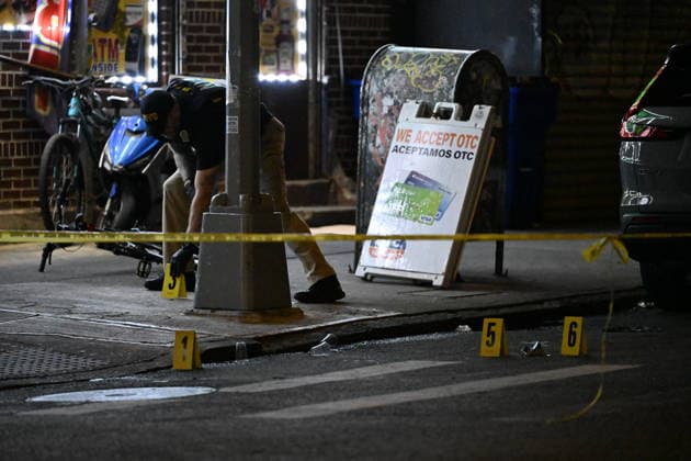 12-year-old boy killed, two men injured in Bronx shooting BRONX, NEW YORK, UNITED STATES - JULY 25: NYPD officers work the scene where a 12-year-old boy was killed and two men were injured in a shooting outside of a Supermarket and Deli at 104 Elliot Place in Bronx, New York, United States on July 25, 2026. Saturday afternoon at approximately 4:55 pm the shooting took place. A 12-year-old boy was shot to the shoulder and taken to Lincoln Hospital where he was pronounced dead. A 25-year-old man was shot to the buttocks and a 34-year-old man was shot to the foot. Both men are listed in stable condition at the hospital. There are no arrests, the identity of the deceased is pending proper family notification and the investigation is ongoing by  Copyright: x2026xAnadoluxKylexMazzax