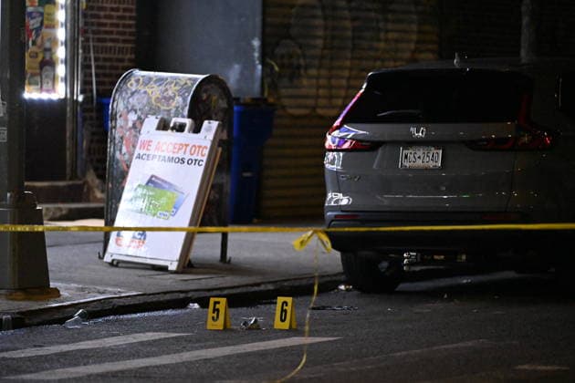 12-year-old boy killed, two men injured in Bronx shooting BRONX, NEW YORK, UNITED STATES - JULY 25: NYPD officers work the scene where a 12-year-old boy was killed and two men were injured in a shooting outside of a Supermarket and Deli at 104 Elliot Place in Bronx, New York, United States on July 25, 2026. Saturday afternoon at approximately 4:55 pm the shooting took place. A 12-year-old boy was shot to the shoulder and taken to Lincoln Hospital where he was pronounced dead. A 25-year-old man was shot to the buttocks and a 34-year-old man was shot to the foot. Both men are listed in stable condition at the hospital. There are no arrests, the identity of the deceased is pending proper family notification and the investigation is ongoing by  Copyright: x2026xAnadoluxKylexMazzax