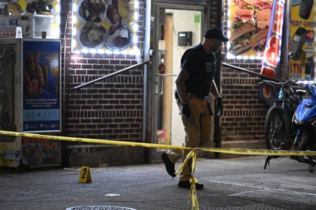 12-year-old boy killed, two men injured in Bronx shooting BRONX, NEW YORK, UNITED STATES - JULY 25: NYPD officers work the scene where a 12-year-old boy was killed and two men were injured in a shooting outside of a Supermarket and Deli at 104 Elliot Place in Bronx, New York, United States on July 25, 2026. Saturday afternoon at approximately 4:55 pm the shooting took place. A 12-year-old boy was shot to the shoulder and taken to Lincoln Hospital where he was pronounced dead. A 25-year-old man was shot to the buttocks and a 34-year-old man was shot to the foot. Both men are listed in stable condition at the hospital. There are no arrests, the identity of the deceased is pending proper family notification and the investigation is ongoing by  Copyright: x2026xAnadoluxKylexMazzax