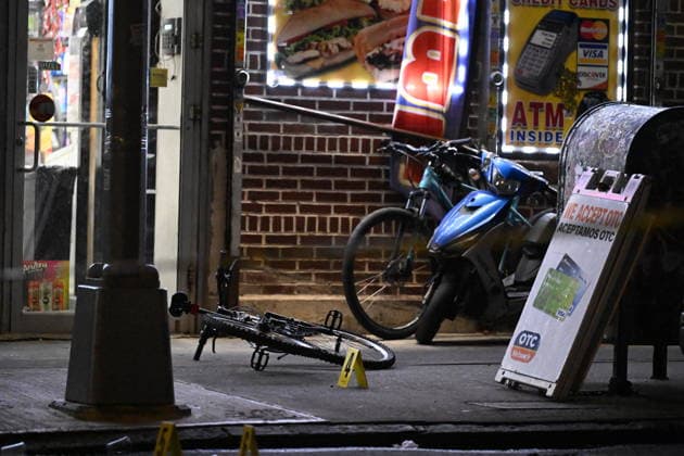 12-year-old boy killed, two men injured in Bronx shooting BRONX, NEW YORK, UNITED STATES - JULY 25: NYPD officers work the scene where a 12-year-old boy was killed and two men were injured in a shooting outside of a Supermarket and Deli at 104 Elliot Place in Bronx, New York, United States on July 25, 2026. Saturday afternoon at approximately 4:55 pm the shooting took place. A 12-year-old boy was shot to the shoulder and taken to Lincoln Hospital where he was pronounced dead. A 25-year-old man was shot to the buttocks and a 34-year-old man was shot to the foot. Both men are listed in stable condition at the hospital. There are no arrests, the identity of the deceased is pending proper family notification and the investigation is ongoing by  Copyright: x2026xAnadoluxKylexMazzax