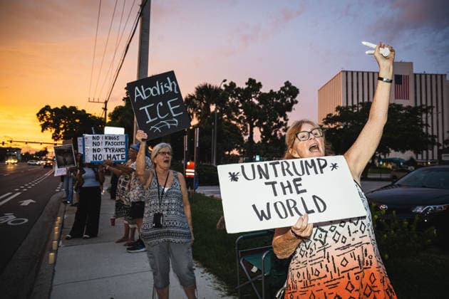 July 25, 2026, Naples, Florida, USA: Protestors hold signs in protest of the IMMIGRATION AND CUSTOMS ENFORCEMENT (ICE) tactics and treatment of community members. Naples USA - ZUMAd256 20260725_znp_d256_042 Copyright: xDavexDeckerx