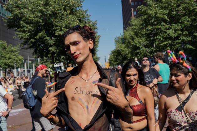 Christopher Street Day Pride Parade Berlin A participant with the word Schlampe written on their chest gestures with their fingers among a crowd during the Christopher Street Day (CSD) Pride parade in Berlin, Germany, on July 25, 2026. The annual event celebrates LGBTQIA+ pride while advocating for equality, diversity, and human rights under the 2026 slogan Taking a stand is Hot. Berlin State of Berlin Germany Copyright: xBabakxBordbarx