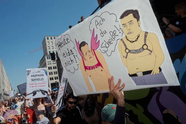 Christopher Street Day Pride Parade Berlin A participant holds a placard depicting Elon Musk and Peter Thiel during the Christopher Street Day (CSD) Pride parade in Berlin, Germany, on July 25, 2026. The annual event celebrates LGBTQIA+ pride while advocating for equality, diversity, and human rights under the 2026 slogan Taking a stand is Hot. Berlin State of Berlin Germany Copyright: xBabakxBordbarx