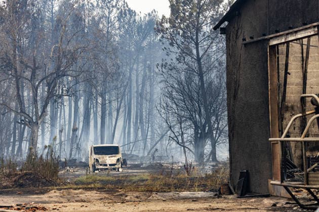 Wildfire evacuees shelter at Bordeaux Exhibition Centre - Bordeaux Burned residential properties are seen after the passage of the wildfire, smoke continues to rise from the affected areas as firefighters monitor remaining hotspots in Lège, France, on July 25, 2026. Photo by Margot Le Gonidec ABACAPRESS.COM Bordeaux France  Copyright: xLexGonidecxMargot ABACAx