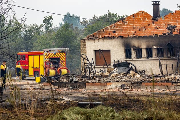Wildfire evacuees shelter at Bordeaux Exhibition Centre - Bordeaux Burned residential properties are seen after the passage of the wildfire, smoke continues to rise from the affected areas as firefighters monitor remaining hotspots in Lège, France, on July 25, 2026. Photo by Margot Le Gonidec ABACAPRESS.COM Bordeaux France  Copyright: xLexGonidecxMargot ABACAx