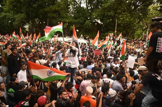 July 26, 2026, Mumbai, Maharashtra, India: Supporters of the youth-led satirical political movement Cockroach Janta Party (CJP) celebrate the resignation of Union Education Minister Dharmendra Pradhan, in Mumbai, India, 26 July 2026. Mumbai India - ZUMAn310 20260726_zip_n310_013 Copyright: xDeepxNairx