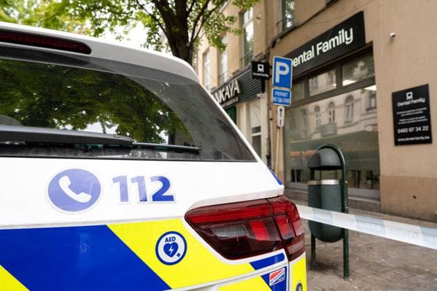 Police pictured outside a residential building at the Haachtsesteenweg chaussee de Haecht in Schaarbeek Schaerbeek, Brussels, where a fire broke out last night, Sunday 26 July 2026. Two people died in the fire. Eight others were injured. Two of them are in serious condition. The cause of the fire is still under investigation. MARIUS BURGELMAN  MariusxBurgelman 182071815