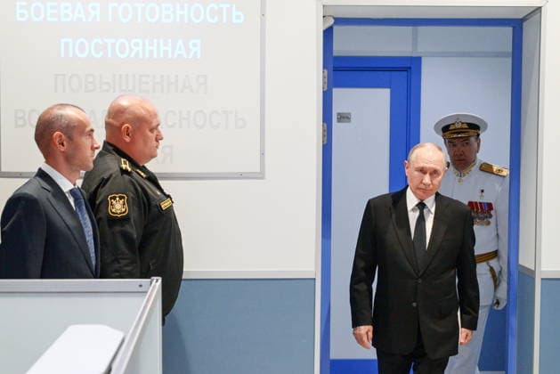 RUSSIA, ST PETERSBURG - JULY 26, 2026: Russia s President Vladimir Putin (2nd R) arrives at the Admiralty Building on Russian Navy Day. Alexei Danichev TASS  95485845