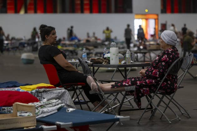 Bordeaux Exhibition Centre Shelters Evacuees from Wildfires BORDEAUX, FRANCE - JULY 26 : The Parc des Expositions de Bordeaux-Lac, located on Cours Jules Ladoumegue, serves as one of the main reception centers for people evacuated due to severe wildfires affecting the Gironde department in southwestern France, providing temporary accommodation, basic services, and logistical support through Gate M as firefighters continue efforts to contain the blaze on July 26, 2026 in Bordeaux, France. Authorities have urged residents to follow official instructions until the situation is brought under control in Bordeaux. Lorena Sopena Lopez Anadolu Bordeaux France. Editorial use only. Please get in touch for any other usage.  Copyright: x2026xAnadoluxLorenaxSopenaxLopezx
