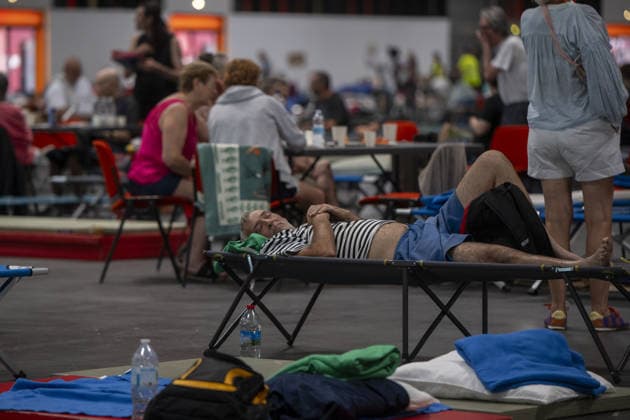 Bordeaux Exhibition Centre Shelters Evacuees from Wildfires BORDEAUX, FRANCE - JULY 26 : The Parc des Expositions de Bordeaux-Lac, located on Cours Jules Ladoumegue, serves as one of the main reception centers for people evacuated due to severe wildfires affecting the Gironde department in southwestern France, providing temporary accommodation, basic services, and logistical support through Gate M as firefighters continue efforts to contain the blaze on July 26, 2026 in Bordeaux, France. Authorities have urged residents to follow official instructions until the situation is brought under control in Bordeaux. Lorena Sopena Lopez Anadolu Bordeaux France. Editorial use only. Please get in touch for any other usage.  Copyright: x2026xAnadoluxLorenaxSopenaxLopezx