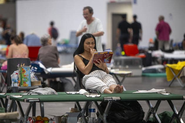 Bordeaux Exhibition Centre Shelters Evacuees from Wildfires BORDEAUX, FRANCE - JULY 26 : The Parc des Expositions de Bordeaux-Lac, located on Cours Jules Ladoumegue, serves as one of the main reception centers for people evacuated due to severe wildfires affecting the Gironde department in southwestern France, providing temporary accommodation, basic services, and logistical support through Gate M as firefighters continue efforts to contain the blaze on July 26, 2026 in Bordeaux, France. Authorities have urged residents to follow official instructions until the situation is brought under control in Bordeaux. Lorena Sopena Lopez Anadolu Bordeaux France. Editorial use only. Please get in touch for any other usage.  Copyright: x2026xAnadoluxLorenaxSopenaxLopezx