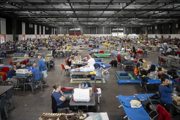 Bordeaux Exhibition Centre Shelters Evacuees from Wildfires BORDEAUX, FRANCE - JULY 26 : The Parc des Expositions de Bordeaux-Lac, located on Cours Jules Ladoumegue, serves as one of the main reception centers for people evacuated due to severe wildfires affecting the Gironde department in southwestern France, providing temporary accommodation, basic services, and logistical support through Gate M as firefighters continue efforts to contain the blaze on July 26, 2026 in Bordeaux, France. Authorities have urged residents to follow official instructions until the situation is brought under control in Bordeaux. Lorena Sopena Lopez Anadolu Bordeaux France. Editorial use only. Please get in touch for any other usage.  Copyright: x2026xAnadoluxLorenaxSopenaxLopezx