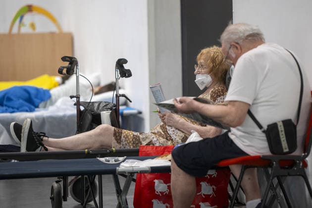 Bordeaux Exhibition Centre Shelters Evacuees from Wildfires BORDEAUX, FRANCE - JULY 26 : The Parc des Expositions de Bordeaux-Lac, located on Cours Jules Ladoumegue, serves as one of the main reception centers for people evacuated due to severe wildfires affecting the Gironde department in southwestern France, providing temporary accommodation, basic services, and logistical support through Gate M as firefighters continue efforts to contain the blaze on July 26, 2026 in Bordeaux, France. Authorities have urged residents to follow official instructions until the situation is brought under control in Bordeaux. Lorena Sopena Lopez Anadolu Bordeaux France. Editorial use only. Please get in touch for any other usage.  Copyright: x2026xAnadoluxLorenaxSopenaxLopezx