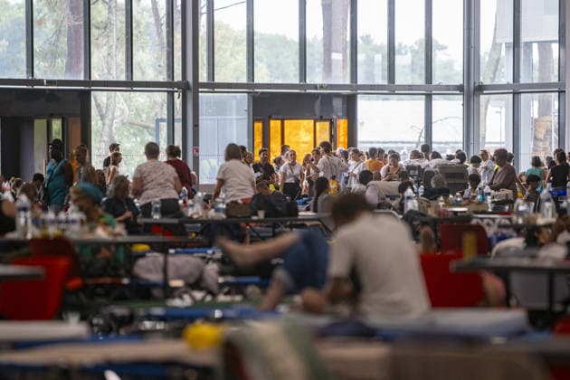 Bordeaux Exhibition Centre Shelters Evacuees from Wildfires BORDEAUX, FRANCE - JULY 26 : The Parc des Expositions de Bordeaux-Lac, located on Cours Jules Ladoumegue, serves as one of the main reception centers for people evacuated due to severe wildfires affecting the Gironde department in southwestern France, providing temporary accommodation, basic services, and logistical support through Gate M as firefighters continue efforts to contain the blaze on July 26, 2026 in Bordeaux, France. Authorities have urged residents to follow official instructions until the situation is brought under control in Bordeaux. Lorena Sopena Lopez Anadolu Bordeaux France. Editorial use only. Please get in touch for any other usage.  Copyright: x2026xAnadoluxLorenaxSopenaxLopezx