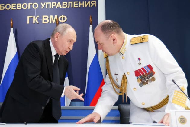 RUSSIA, ST PETERSBURG - JULY 26, 2026: Russia s President Vladimir Putin (L) and Russian Navy Commander-in-Chief Admiral Alexander Moiseyev are seen during a meeting with senior officers of the Russian Navy at the Admiralty Building on Russian Navy Day. Vyacheslav Prokofyev Russian Presidential Press and Information Office TASS  95487719