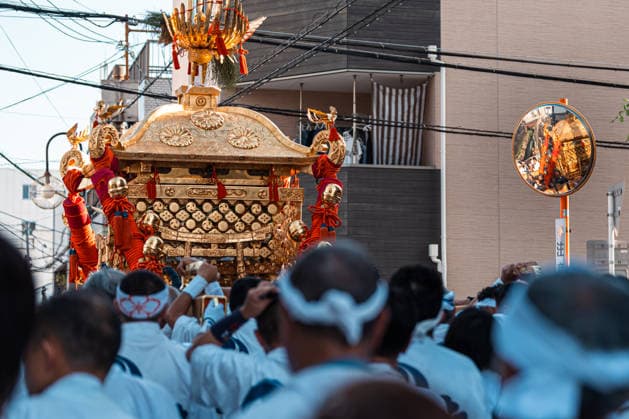 General view, July 26, 2026 - Participants carry a portable shrine (mikoshi) during the Mikoshi Togyo procession of the Sumiyoshi Matsuri at Sumiyoshi Taisha in Osaka, Japan. The annual procession is one of the festival s main events, as worshippers parade the sacred mikoshi through the surrounding streets as part of a centuries-old Shinto tradition.  aflo_339206521
