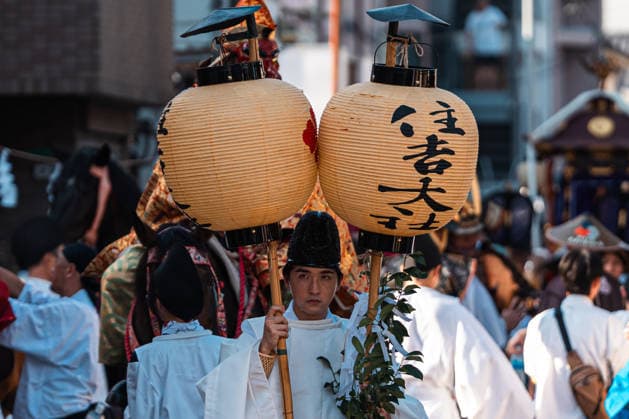 General view, July 26, 2026 - Participants carry a portable shrine (mikoshi) during the Mikoshi Togyo procession of the Sumiyoshi Matsuri at Sumiyoshi Taisha in Osaka, Japan. The annual procession is one of the festival s main events, as worshippers parade the sacred mikoshi through the surrounding streets as part of a centuries-old Shinto tradition.  aflo_339206523