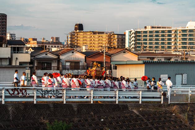 General view, July 26, 2026 - Participants carry a portable shrine (mikoshi) during the Mikoshi Togyo procession of the Sumiyoshi Matsuri at Sumiyoshi Taisha in Osaka, Japan. The annual procession is one of the festival s main events, as worshippers parade the sacred mikoshi through the surrounding streets as part of a centuries-old Shinto tradition.  aflo_339206533