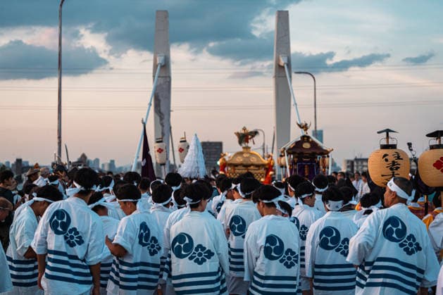 General view, July 26, 2026 - Participants carry a portable shrine (mikoshi) during the Mikoshi Togyo procession of the Sumiyoshi Matsuri at Sumiyoshi Taisha in Osaka, Japan. The annual procession is one of the festival s main events, as worshippers parade the sacred mikoshi through the surrounding streets as part of a centuries-old Shinto tradition.  aflo_339206551