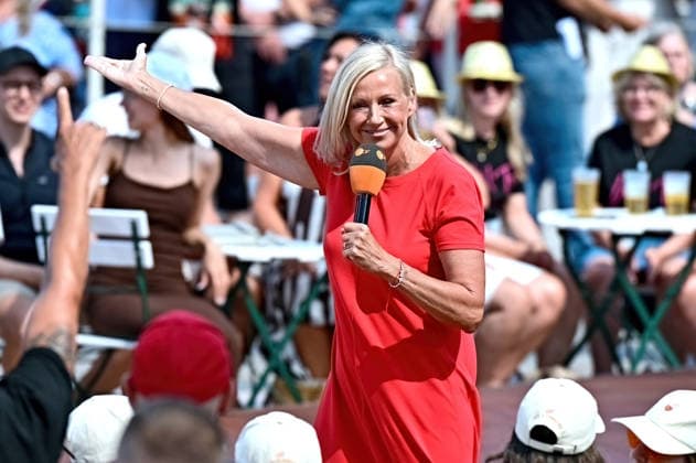 ZDF - Fernsehgarten. Moderatorin Andrea Kiwi Kiewel während der ZDF - Unterhaltungsshow Fernsehgarten am 26.07.2026 in Mainz. 20260726MWI136914 *** ZDF Fernsehgarten host Andrea Kiwi Kiewel during the ZDF entertainment show Fernsehgarten on July 26, 2026, in Mainz 20260726MWI136914