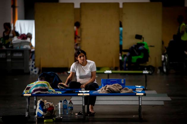 Thousands Of Gironde Wildfire Evacuees Sheltered At The Bordeaux Exhibition Centre Thousands of people evacuated from their homes rest at the Bordeaux Exhibition Centre, which has been converted into a temporary emergency shelter following a major wildfire affecting the Gironde department in southwestern France on Saturday. French authorities have transformed the exhibition halls into an emergency reception facility to accommodate families displaced from several municipalities, providing medical assistance, food and psychological support, while firefighters continue efforts to contain the fire, which has forced the evacuation of tens of thousands of people. In Bordeaux, France, on July 26, 2026. Burdeaux France  Copyright: xAlbertxLlopx originalFilename: salame-thousand260726_npOAP.jpg