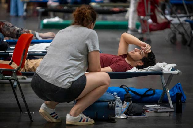 Thousands Of Gironde Wildfire Evacuees Sheltered At The Bordeaux Exhibition Centre Thousands of people evacuated from their homes rest at the Bordeaux Exhibition Centre, which has been converted into a temporary emergency shelter following a major wildfire affecting the Gironde department in southwestern France on Saturday. French authorities have transformed the exhibition halls into an emergency reception facility to accommodate families displaced from several municipalities, providing medical assistance, food and psychological support, while firefighters continue efforts to contain the fire, which has forced the evacuation of tens of thousands of people. In Bordeaux, France, on July 26, 2026. Burdeaux France  Copyright: xAlbertxLlopx originalFilename: salame-thousand260726_np7Lx.jpg