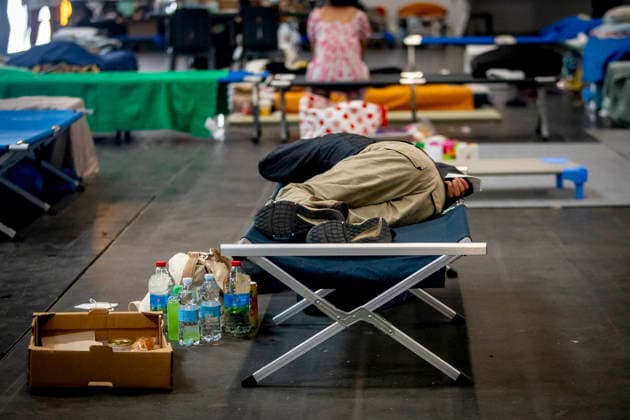 Thousands Of Gironde Wildfire Evacuees Sheltered At The Bordeaux Exhibition Centre Thousands of people evacuated from their homes rest at the Bordeaux Exhibition Centre, which has been converted into a temporary emergency shelter following a major wildfire affecting the Gironde department in southwestern France on Saturday. French authorities have transformed the exhibition halls into an emergency reception facility to accommodate families displaced from several municipalities, providing medical assistance, food and psychological support, while firefighters continue efforts to contain the fire, which has forced the evacuation of tens of thousands of people. In Bordeaux, France, on July 26, 2026. Burdeaux France  Copyright: xAlbertxLlopx originalFilename: salame-thousand260726_npLDr.jpg