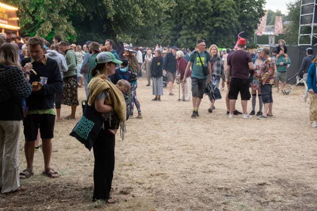 July 26, 2026, Corsham, Wiltshire, England: Festival goers enjoy a sunny Saturday at WOMAD Festival at Neston Park in Wiltshire. Corsham United Kingdom  - ZUMAr169 20260726_zip_r169_027 Copyright: xRodxHarbinsonx