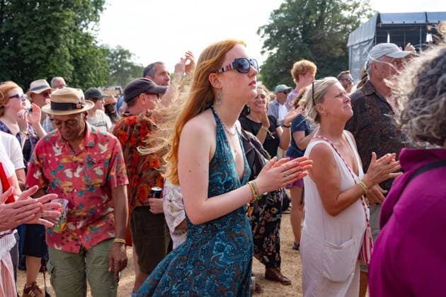 July 26, 2026, Corsham, Wiltshire, England: Festival goers enjoy a sunny Saturday at WOMAD Festival at Neston Park in Wiltshire. Corsham United Kingdom  - ZUMAr169 20260726_zip_r169_006 Copyright: xRodxHarbinsonx