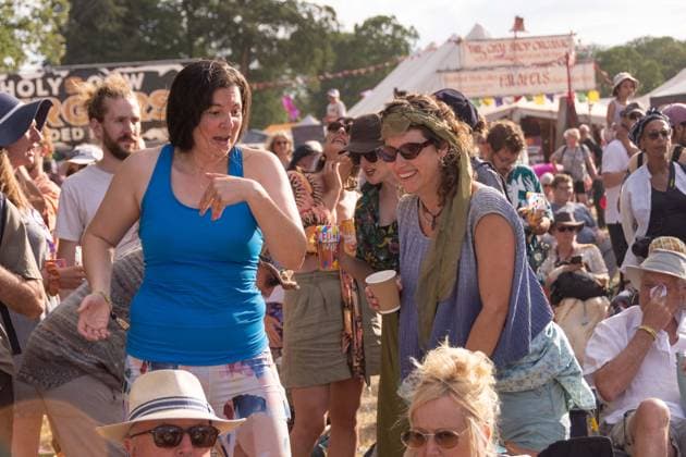 July 26, 2026, Corsham, Wiltshire, England: Festival goers enjoy a sunny Saturday at WOMAD Festival at Neston Park in Wiltshire. Corsham United Kingdom  - ZUMAr169 20260726_zip_r169_012 Copyright: xRodxHarbinsonx
