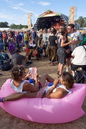 July 26, 2026, Corsham, Wiltshire, England: Festival goers enjoy a sunny Saturday at WOMAD Festival at Neston Park in Wiltshire. Corsham United Kingdom  - ZUMAr169 20260726_zip_r169_003 Copyright: xRodxHarbinsonx