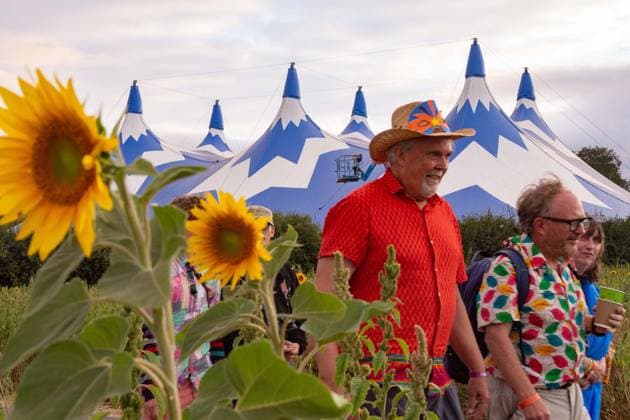 July 26, 2026, Corsham, Wiltshire, England: Festival goers enjoy a sunny Saturday at WOMAD Festival at Neston Park in Wiltshire. Corsham United Kingdom  - ZUMAr169 20260726_zip_r169_021 Copyright: xRodxHarbinsonx
