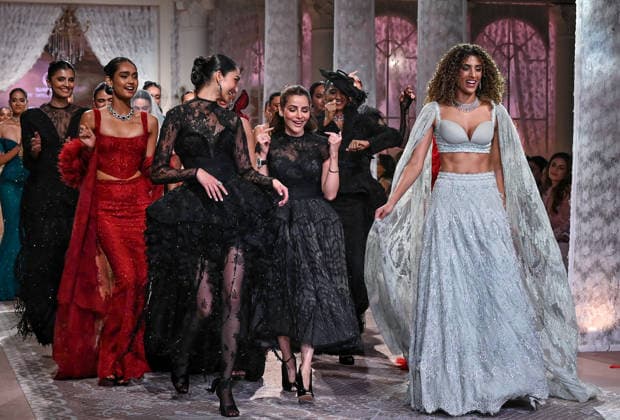 India Couture Week Day 3 New Delhi, Jul 26 (ANI): Models walk the ramp during Day 2 of India Couture Week, in New Delhi on Sunday. NEW DELHI Delhi India Copyright: xANIx ANI_20260726392