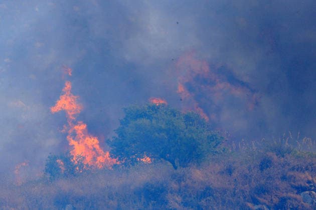 Firefighters battle wildfire near Italy s Palermo PALERMO, ITALY - JULY 26: Firefighter crews launched an aerial and ground response to contain a wildfire that broke out in scrubland near Torretta, outside Palermo on the island of Sicily, Italy on July 26, 2026. Fire engines and two firefighting aircraft were deployed as the blaze threatened nearby residential areas. Alberto Lo Bianco Anadolu Sicily Italy. Editorial use only. Please get in touch for any other usage.  Copyright: x2026xAnadoluxAlbertoxLoxBiancox