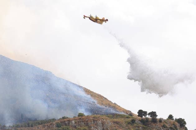 Firefighters battle wildfire near Italy s Palermo PALERMO, ITALY - JULY 26: Firefighter crews launched an aerial and ground response to contain a wildfire that broke out in scrubland near Torretta, outside Palermo on the island of Sicily, Italy on July 26, 2026. Fire engines and two firefighting aircraft were deployed as the blaze threatened nearby residential areas. Alberto Lo Bianco Anadolu Sicily Italy. Editorial use only. Please get in touch for any other usage.  Copyright: x2026xAnadoluxAlbertoxLoxBiancox