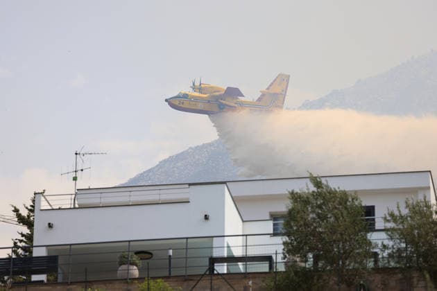 Firefighters battle wildfire near Italy s Palermo PALERMO, ITALY - JULY 26: Firefighter crews launched an aerial and ground response to contain a wildfire that broke out in scrubland near Torretta, outside Palermo on the island of Sicily, Italy on July 26, 2026. Fire engines and two firefighting aircraft were deployed as the blaze threatened nearby residential areas. Alberto Lo Bianco Anadolu Sicily Italy. Editorial use only. Please get in touch for any other usage.  Copyright: x2026xAnadoluxAlbertoxLoxBiancox
