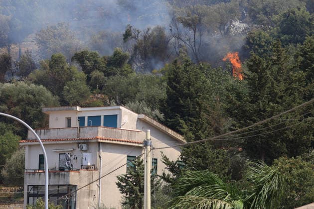 Firefighters battle wildfire near Italy s Palermo PALERMO, ITALY - JULY 26: Firefighter crews launched an aerial and ground response to contain a wildfire that broke out in scrubland near Torretta, outside Palermo on the island of Sicily, Italy on July 26, 2026. Fire engines and two firefighting aircraft were deployed as the blaze threatened nearby residential areas. Alberto Lo Bianco Anadolu Sicily Italy. Editorial use only. Please get in touch for any other usage.  Copyright: x2026xAnadoluxAlbertoxLoxBiancox