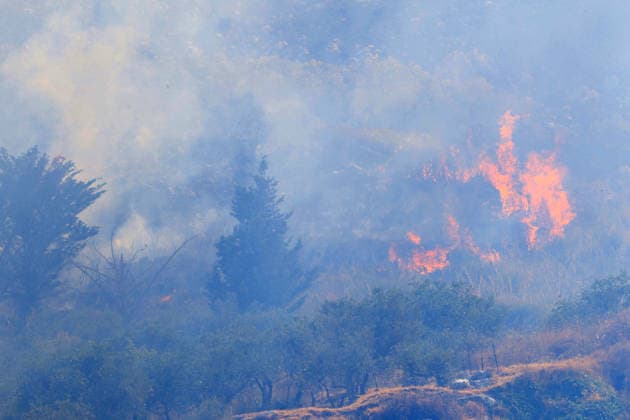 Firefighters battle wildfire near Italy s Palermo PALERMO, ITALY - JULY 26: Firefighter crews launched an aerial and ground response to contain a wildfire that broke out in scrubland near Torretta, outside Palermo on the island of Sicily, Italy on July 26, 2026. Fire engines and two firefighting aircraft were deployed as the blaze threatened nearby residential areas. Alberto Lo Bianco Anadolu Sicily Italy. Editorial use only. Please get in touch for any other usage.  Copyright: x2026xAnadoluxAlbertoxLoxBiancox