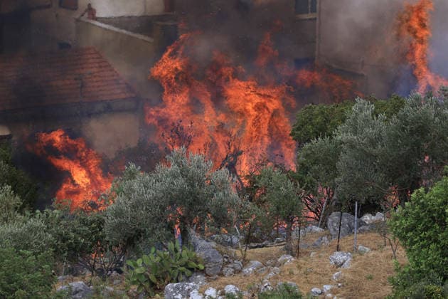 Firefighters battle wildfire near Italy s Palermo PALERMO, ITALY - JULY 26: Firefighter crews launched an aerial and ground response to contain a wildfire that broke out in scrubland near Torretta, outside Palermo on the island of Sicily, Italy on July 26, 2026. Fire engines and two firefighting aircraft were deployed as the blaze threatened nearby residential areas. Alberto Lo Bianco Anadolu Sicily Italy. Editorial use only. Please get in touch for any other usage.  Copyright: x2026xAnadoluxAlbertoxLoxBiancox