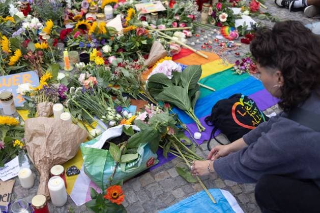 July 26, 2026, Berlin, Berlin, Germany: BERLIN, GERMANY Ã¢â‚¬ JULY 26, 2026: People gather for a vigil at the Brandenburg Gate in Berlin, Germany, in solidarity with those affected by the deadly attack near the city s Christopher Street Day (CSD) Pride celebrations a day earlier. Members of the LGBTQIA+ community and allies mourned the victims, called for unity and reaffirmed their commitment to combating homophobia, transphobia, fascism and all forms of hatred. Speakers also urged politicians and the media not to exploit the tragedy to promote Islamophobic, anti-Arab or other discriminatory narratives. Berlin Germany  - ZUMAq101 20260726_zna_q101_185 Copyright: xZairaxBiaginix
