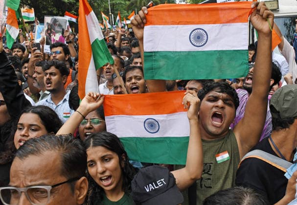 Celebrations after the resignation of Union Education Minister Dharmendra Pradhan in Mumbai, India - 26 Jul 2026 Citizens seen holding Indian national flags and shout slogans during the celebration held after the resignation of Union Education Minister Dharmendra Pradhan. Youth led Cockroach Janata Party (CJP) protest which lasted for 36 days concluded on July 25 2026 after the government accepted the key demands put forth by leaders of Cockroach Janata Party (CJP) alongside resignation of Union Education Minister Dharmendra Pradhan in alleged paper leaks and irregularities found in major national medical entrance examinations. Mumbai India Copyright: xAshishxVaishnavx xSOPAxImagesx AVaishnav_Celebration after resignation of Union Education Minister Dharmendra Pradhan in Mumbai(2)