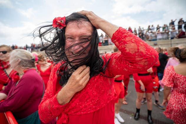 The Most Wuthering Day Ever in Folkestone, UK - 26 Jul 2026 A participant dressed as Cathy takes part in the Most Wuthering Heights Day Ever in Folkestone. Folkestone once again hosted The Most Wuthering Heights Day Ever, as hundreds of participants dressed in flowing red gathered to recreate the iconic dance from Kate Bush s 1978 hit, Wuthering Heights. Continuing a tradition that began in 2018, the event welcomed both returning dancers and newcomers, celebrating music, creativity, and community while transforming the Harbour Arm into a sea of red. Folkstone United Kingdom Copyright: xJamesxWilloughbyx xSOPAxImagesx JWILLOUGHBY_3085