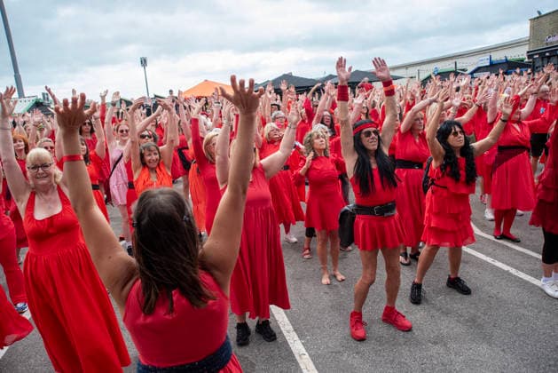 July 26, 2026, London, United Kingdom: Performers seen dressed as Kate Bush during a rehearsal of the Most Wuthering Heights Day Ever performance in Folkstone. Hundreds of people attended the annual event called The Most Wuthering Heights Ever 2026 in Folkstone. It is one of the biggest Kate Bush gatherings in the country. People come from as far as New Zealand, USA and Costa Rica to join to the performance. London United Kingdom  - ZUMAs197 20260726_aaa_s197_078 Copyright: xKrisztianxElekx
