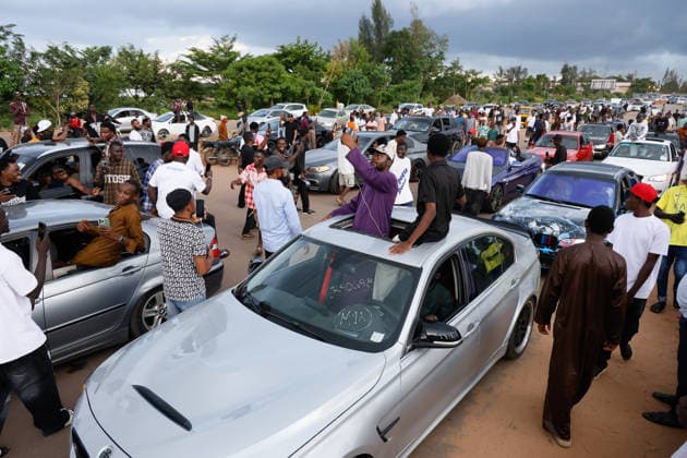 Nigerian youth showcase passion for car racing ABUJA, NIGERIA - JULY 26: Young car enthusiasts compete with their modified vehicles during a car racing event in Abuja, Nigeria, on July 26, 2026. The event features classic and sports cars as participants showcase their driving skills and passion for automobiles. Emmanuel Osodi Anadolu Abuja Nigeria. Editorial use only. Please get in touch for any other usage.  Copyright: x2026xAnadoluxEmmanuelxOsodix